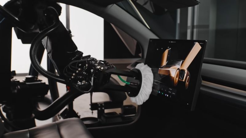 Tesla показала футуристического робота-уборщика для беспилотных такси Cybercab